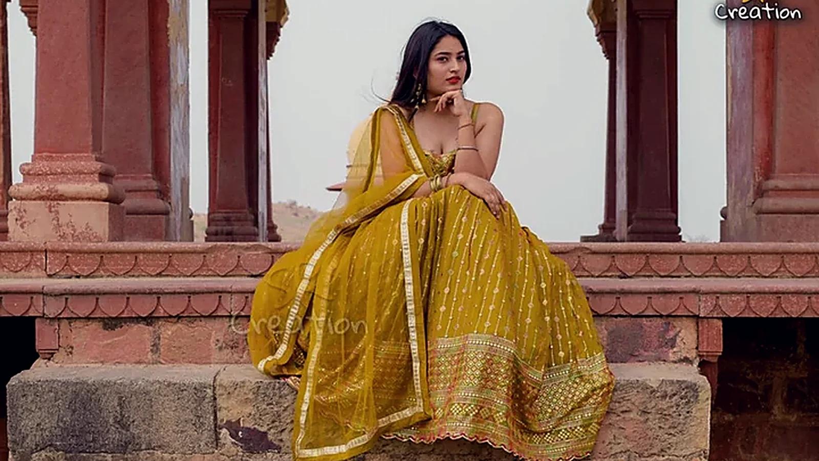 Model in a lehenga photographed at a heritage location